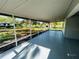 Large screened porch with a view of the backyard at 2013 Finland Dr, Spring Hill, FL 34609
