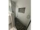 Bright shower with hexagonal mosaic tile accents and glass enclosure at 2013 Finland Dr, Spring Hill, FL 34609