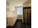 Updated kitchen with white cabinets and stainless steel appliances at 2013 Finland Dr, Spring Hill, FL 34609