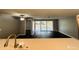 Living room with sliding glass doors leading to the patio at 2013 Finland Dr, Spring Hill, FL 34609