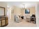 Home office with built-in desk and comfortable seating at 13002 Wedgewood Way # D, Hudson, FL 34667