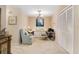 Home office with built-in desk and comfortable seating at 13002 Wedgewood Way # D, Hudson, FL 34667
