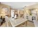 Bright dining area with a table, chairs, and built-in hutch at 13002 Wedgewood Way # D, Hudson, FL 34667