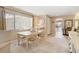 Charming dining room with a table and four chairs, near the entryway at 13002 Wedgewood Way # D, Hudson, FL 34667