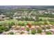 Wide aerial view showcasing the property's location in a residential area at 13002 Wedgewood Way # D, Hudson, FL 34667