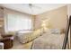 Guest bedroom with twin beds and window seating at 13002 Wedgewood Way # D, Hudson, FL 34667