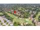 Aerial view showing property location near golf course and community at 13002 Wedgewood Way # D, Hudson, FL 34667