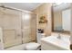 Bathroom with tub shower combo and updated vanity at 13002 Wedgewood Way # D, Hudson, FL 34667