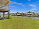 Backyard with canal view and lush green grass at 7332 Islander Ln, Hudson, FL 34667