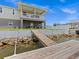 Wooden dock and steps leading to the water from backyard at 7332 Islander Ln, Hudson, FL 34667