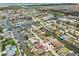 Aerial view of waterfront property with private boat dock and canal access at 7332 Islander Ln, Hudson, FL 34667