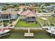 Two-story house with a private dock, situated on a canal at 7332 Islander Ln, Hudson, FL 34667