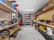 Workshop area with various tools and workbenches at 7332 Islander Ln, Hudson, FL 34667