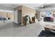 Garage with car and various storage items at 7332 Islander Ln, Hudson, FL 34667