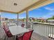 Deck overlooking canal with seating for outdoor dining at 7332 Islander Ln, Hudson, FL 34667