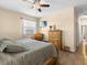 Spacious bedroom with ample closet space and a comfortable bed at 7332 Islander Ln, Hudson, FL 34667