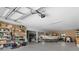 Spacious garage with boat and storage shelving at 7332 Islander Ln, Hudson, FL 34667