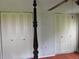 Bedroom with double closets and hardwood floors at 10526 Mira Vista Dr, Port Richey, FL 34668
