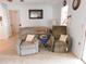 Relaxing living room with two recliners and ample space at 10526 Mira Vista Dr, Port Richey, FL 34668