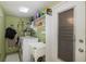 Laundry room with washer, dryer, and utility sink at 12709 Clock Tower Pkwy, Hudson, FL 34667