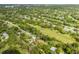 Aerial view of house and surrounding neighborhood at 12709 Clock Tower Pkwy, Hudson, FL 34667
