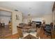 Dining room with a glass-top table and wicker chairs at 12709 Clock Tower Pkwy, Hudson, FL 34667