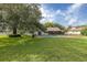 Private backyard with a refreshing pool and fenced-in area at 12709 Clock Tower Pkwy, Hudson, FL 34667