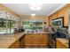Updated kitchen with granite countertops and stainless steel appliances at 12709 Clock Tower Pkwy, Hudson, FL 34667