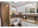 Clean bathroom with shower, toilet, and granite vanity at 12709 Clock Tower Pkwy, Hudson, FL 34667