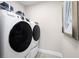 Laundry room with side-by-side washer and dryer at 8731 Starry Night Ter, Parrish, FL 34219