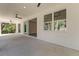 Covered patio featuring recessed lighting, ceiling fans, and sliding glass doors to the interior at 9229 Creston Ave, New Port Richey, FL 34654