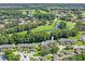 Aerial view showing home location near golf course at 3275 Lori Ln # 5, New Port Richey, FL 34655