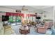 Spacious living room featuring a mirrored wall and ample natural light at 3275 Lori Ln # 5, New Port Richey, FL 34655