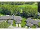 Aerial view showcasing the community's location near a golf course at 3275 Lori Ln # 5, New Port Richey, FL 34655