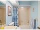 Clean bathroom with a bathtub, shower, and patterned curtain at 3275 Lori Ln # 5, New Port Richey, FL 34655