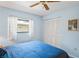 Light and airy bedroom with a double bed, window, and closet at 3275 Lori Ln # 5, New Port Richey, FL 34655