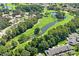 Aerial view of community with golf course and homes at 3275 Lori Ln # 5, New Port Richey, FL 34655