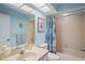 Inviting bathroom featuring a bathtub, sink, and vanity at 3275 Lori Ln # 5, New Port Richey, FL 34655