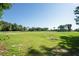 Expansive green golf course with clear blue sky at 3275 Lori Ln # 5, New Port Richey, FL 34655