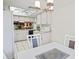 Bright kitchen features ample cabinetry, modern appliances, and tile flooring at 3275 Lori Ln # 5, New Port Richey, FL 34655