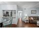 Open living area with kitchen, dining, and hallway views at 3232 Lake Pine E Way # H2, Tarpon Springs, FL 34688