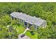 Aerial view of condo building exterior at 3232 Lake Pine E Way # H2, Tarpon Springs, FL 34688