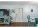 Entryway with a white door and teal colored accents at 3232 Lake Pine E Way # H2, Tarpon Springs, FL 34688