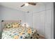 Spacious bedroom with large closet and coastal decor at 3232 Lake Pine E Way # H2, Tarpon Springs, FL 34688