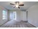 Spacious bedroom with carpet flooring and neutral walls at 1423 Meadow Lark Rd, Spring Hill, FL 34608