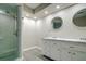 Updated bathroom with double vanity and marble countertop at 1423 Meadow Lark Rd, Spring Hill, FL 34608