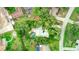 Aerial view showing home, pool, and surrounding landscape at 1423 Meadow Lark Rd, Spring Hill, FL 34608