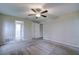 Spacious bedroom with neutral walls and plush carpeting at 1423 Meadow Lark Rd, Spring Hill, FL 34608