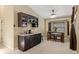 Cozy kitchen nook featuring modern lighting and ample natural light from the adjacent window at 6096 Kinlock Ave, Spring Hill, FL 34608