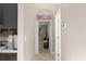 Hallway with neutral paint and tile leading to other rooms in the house at 6096 Kinlock Ave, Spring Hill, FL 34608